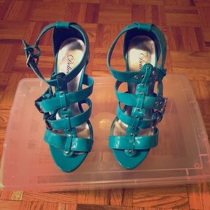 Aqua blue buckled heels